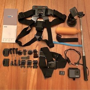 GoPro 7 Silver Like new only used twice. 24 accessories! Go Pro Camera